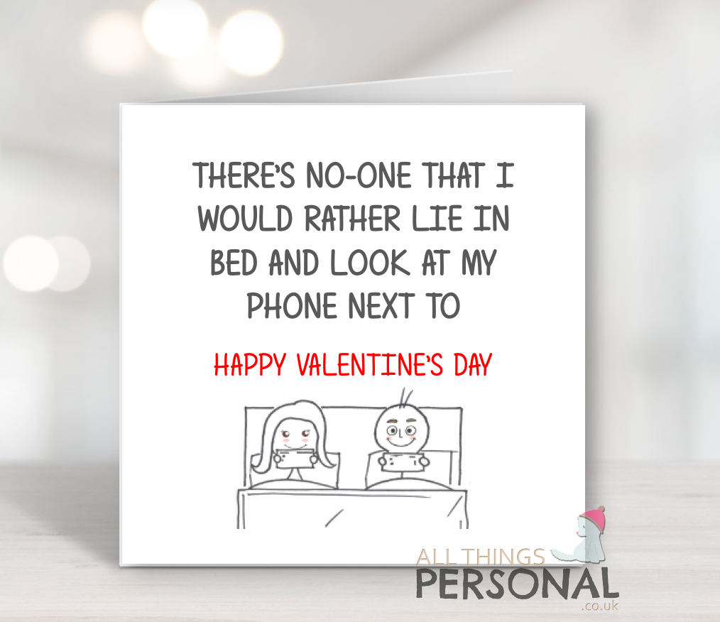 lie in bed and look at my phone next to valentine's day card Lie In Bed And Look At My Phone Next To Valentine's Day Card - Image 1