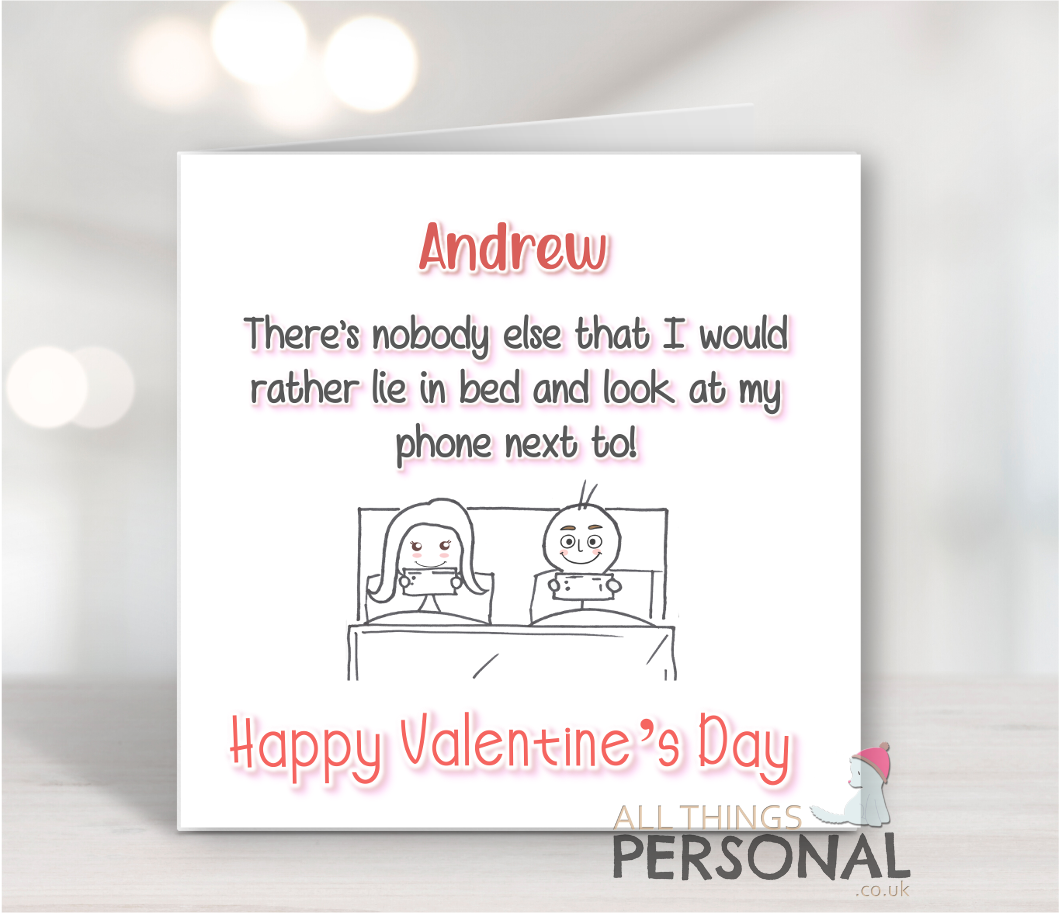 Look at my phone next to valentines day card Lie In Bed And Look At My Phone Next To Valentine's Day Card - Image 1